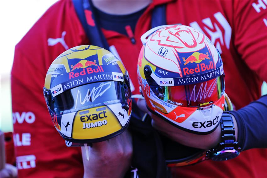 Two f1 helmets signed